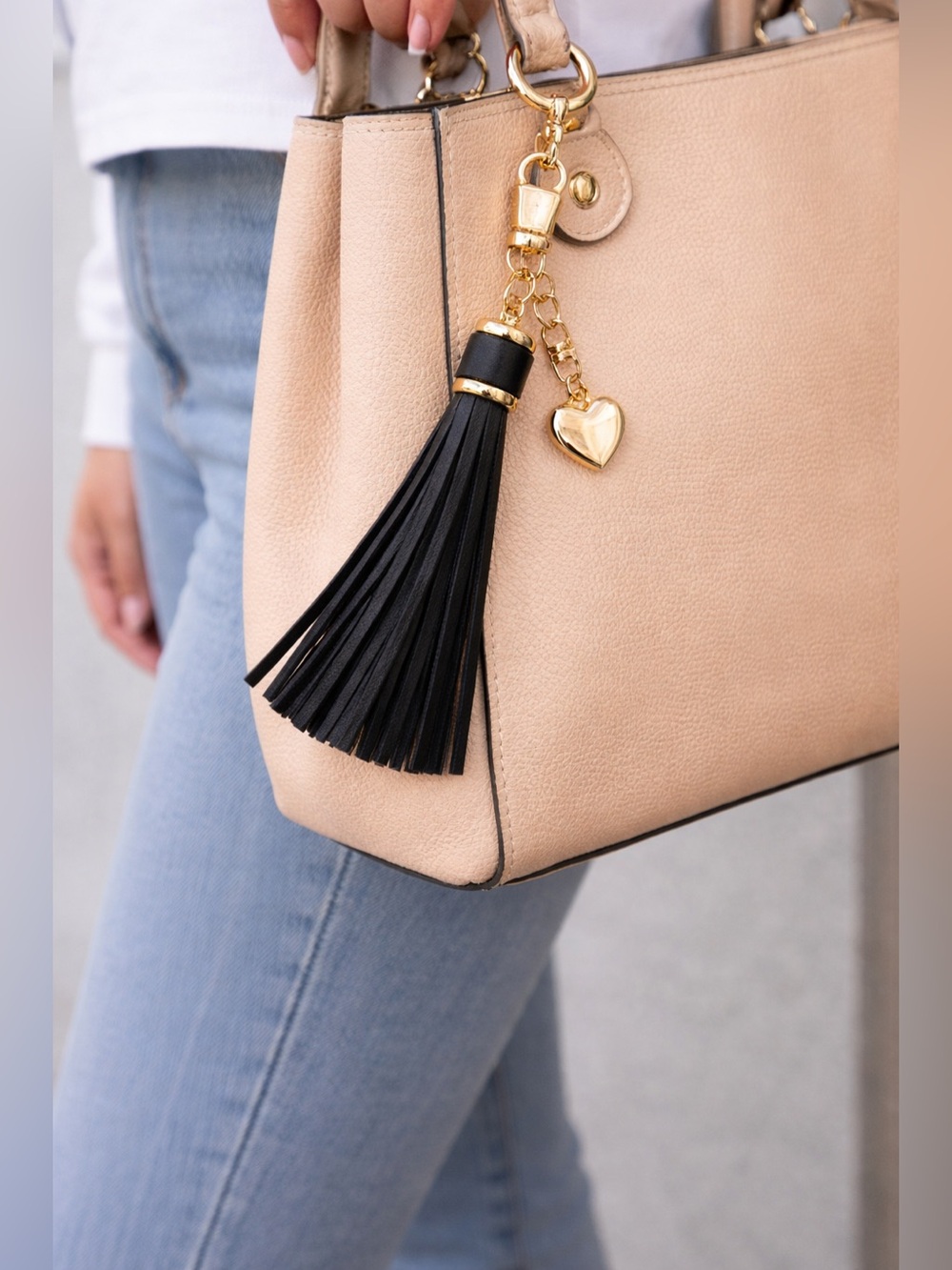 NEW. 🖤 Bag charm or keychain. Faux leather tassel, removable puffy heart charm